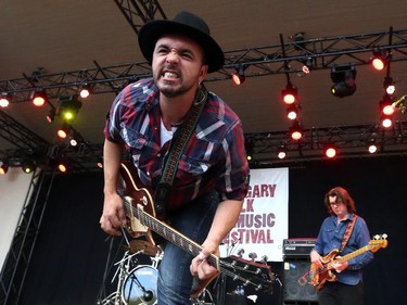 Hawksley Workman shares his flamboyant presence on the Main Stage at the Folk Festival in Calgary, on July 24, 2015.