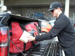 Lance Bouma, seen packing up at Calgary Flames' garbage bag day in May, is one of three Calgary Flames players to file for salary arbitration.