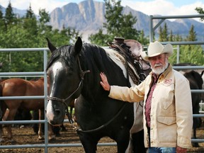 Stan Cowley, with his horse Momma's Boy, 9,  is excited for a new season with his tours Cowley's Rafter Six Trail Riding Specialists in the Canadian Rockies which operates beside the Rafter Six  buildings that he lost in a receivership last year.  He also offers camping on the land. (Lorraine Hjalte/Calgary Herald) For News story by Annalise Klingbeil. Trax # 00066371A