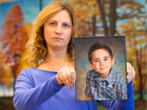 Layale Khalifeh holds a picture of her son Jad in Calgary last September.