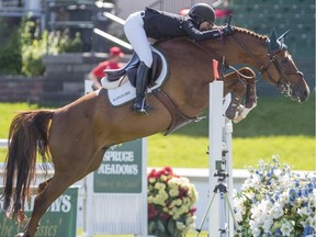 Ali Wolff rides Casall during the Spruce Meadows 'North American' Atco Energy Solutions Cup in Calgary, on July 1, 2015.