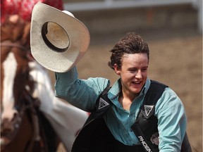 Zeke Thurston takes a victory lap after riding Awesome to a win in the saddle bronc competition at the Calgary Stampede on Wednesday.
