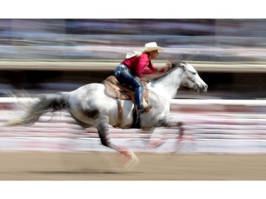 CALGARY.;  July 10, 2015, 2015  -- Christine Laughlin from Colorado, during the Calgary Stampede Barrel Racing Championship. Photo Leah Hennel/Calgary Herald