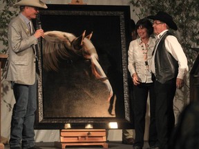 The original artworks used to create Stampede posters, such as this piece by Adeline Halvorson in 2013,  will no longer be auctioned off. Instead, the Calgary Stampede will display them in the not-yet-constructed SAM Centre.