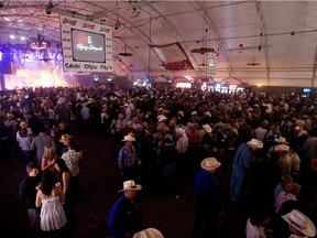 The after-rodeo crowd gathers at Nashville North on the Stampede grounds in Calgary, July 9, 2009.