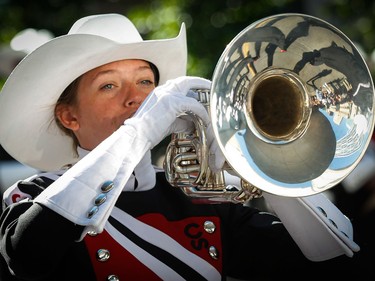 A member of the Calgary Stampede Showband takes part in the event in Calgary on Friday, July 3.