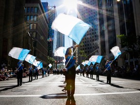 A marching band performs during the 2015 Calgary Stampede parade.