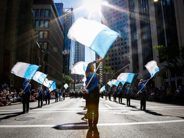 A marching band performs during the Calgary Stampede parade in Calgary, Friday, July 3.