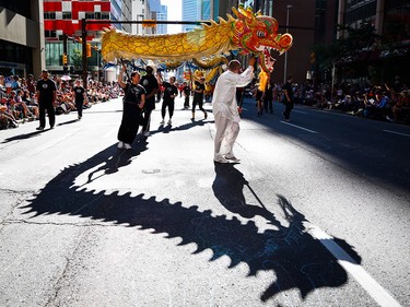 A Chinese dragon during the Calgary Stampede parade in Calgary, Friday, July 3.