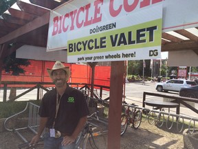 Leor Rotchild of Dig events watching over bikes at the Calgary Stampede's new bike valet.