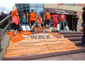 Theo Fleury arrives in Eau Claire plaza on his Victor Walk, to promote awareness of childhood trauma.