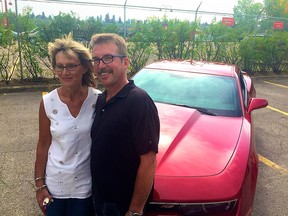 Marty and Gloria Jurgens won the early bird prize in the Calgary Stampede charity lotteries, a 2015 Chevrolet Camaro Coupe