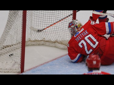 Team Russia goalie Maxim Tretyak watches the puck enter the net in the opening game of the World's Junior Showcase at the Markin MacPhail Centre in Calgary on Monday, Aug. 3, 2015. Team Canada was tied with Team Russia, 1-1, at the end of the first period.