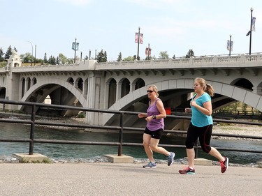 Calgarians enjoy the killer weather by biking, walking and jogging on Calgary's path systems, in Calgary on August 10, 2015.