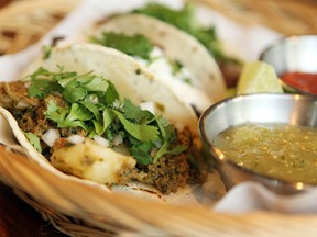 The Chorizo Tacos de Guisados is one of the special tacos at the Native Tongues Taqueria .