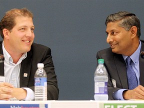 PC candidate Blair Houston, left, and Wildrose candidate Prasad Panda spoke during the Calgary Leadership Forum all candidates debate for the Calgary Foothills by-election. The debate was held at the Foothills Alliance Church on August 24, 2015.