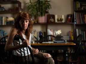 Karen Casey sits in her home on Edmonton Trail in Calgary.