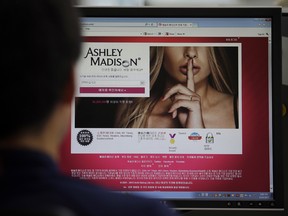 FILE - A June 10, 2015 photo from files showing Ashley Madison's Korean web site on a computer screen in Seoul, South Korea. Hackers claim to have leaked a massive database of users from Ashley Madison, a matchmaking website for cheating spouses. In a statement released Tuesday, Aug. 18, 2015, a group calling itself Impact Team said the site's owners had not bowed to their demands. "Now everyone gets to see their data," the statement said. (AP Photo/Lee Jin-man, File)