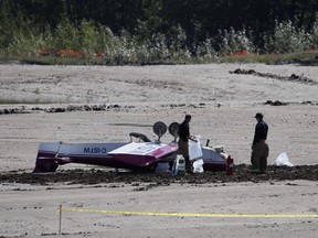 A small plane crashed and landed on its roof in the Walden area in southeast Calgary on Saturday, Aug. 22, 2015.