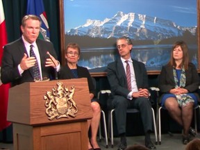 Dave Mowat, chairman of Alberta's royalty review panel talks about its mandate and unveils new members during a news conference in Edmonton on August 28, 2015.