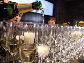 Colleen De Neve/ Calgary Herald CALGARY, AB --APRIL 1, 2015 -- Champagne was poured for the opening inside the new Century Downs Casino and Racetrack in Balzac on April 1, 2015. (Colleen De Neve/Calgary Herald) (For Business story by Mario Toneguzzi) 00063766A SLUG: 0402-Casino Racetrack