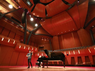 Violinist Timothy Chooi rehearses in Mount Royal University's Bella Concert Hall in the new Taylor Centre for the Performing Arts on Tuesday, August 25. The $90.5-million facility is set to officially open tomorrow.