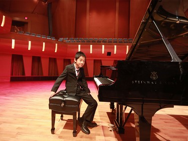 Piano prodigy Kevin Chen, 10, smiles after rehearsing in Mount Royal University's new Bella Concert Hall in the new Taylor Centre for the Performing Arts on Tuesday, August 25. The $90.5-million facility is set to officially open tomorrow.