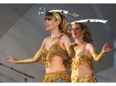 Calgary, AB. August 22.  2015 -- Nadia Brante (foreground) and Heather Arnot perform an Egyptian sword dance at GlobalFest Saturday night on the main stage.  ({David Moll} /Calgary Herald) For {} story by {}