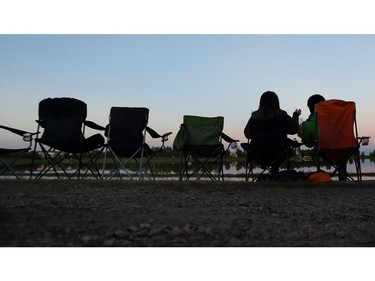 The early bird get the best seat as this couple did just that to ensure a front row seat for the fireworks display at GlobalFest Saturday night.