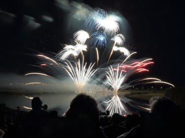 The sky to the east is illuminated with fireworks by team China at  GlobalFest Saturday night.
