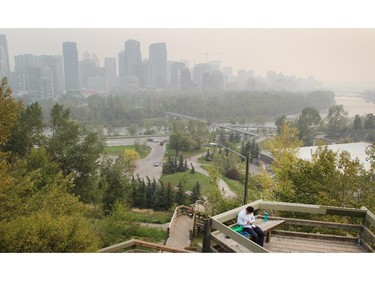 The downtown is shrouded in smoke from fires in Washington as seen from the McHugh Bluff Tuesday August 26, 2015.