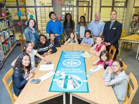 St. Monica school's junior ATB financial literacy program has students playing the role of banker, and taking responsibility for simple financial choices.