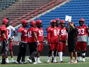 The Stampeders defence works on strategy at Thursday's practice at McMahon Stadium in preparation for Saturday's visit by the Ottawa Redblacks.