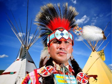 Jared Buffalo, 38, from Maskwacis, Samson Cree Nation, before competing in men's traditional dance at the Siksika Nation Fair Powwow.