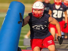 Calgary Colts linebacker Jakub Jakoubek practices at Edge School in Springbank on Tuesday, Aug. 11, 2015.