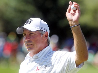 Champions Tour player Fred Couples saluted the crowd after sinking his putt on the 18th green during the second round of the Shaw Charity Classic at the Canyon Meadows Golf and Country Club on August 7, 2015. Couples finished the day with a score of minus 8.