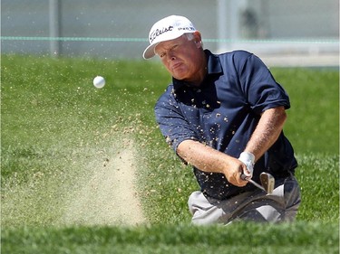 Champions Tour player Peter Senior chipped out of the sand and onto the green on the 8th hole during the second round of the Shaw Charity Classic at the Canyon Meadows Golf and Country Club on August 7, 2015.