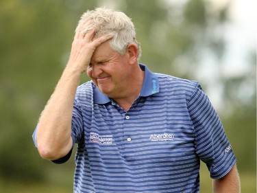 Champions Tour player Colin Montgomerie reacted after sinking his final putt on the 18th green during the final round of the Shaw Charity Classic at the Canyon Meadows Golf and Country Club on August 9, 2015.  Montgomerie had stated the day with a share of the lead but in the end, Jeff Maggert won the tournament with a score of -16.