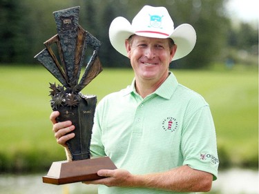 Champions Tour player Jeff Maggert from Sea Pines, SC hoisted the winners trophy after posting a final score of -16 to clinch the Shaw Charity Classic at the Canyon Meadows Golf and Country Club on August 9, 2015.
