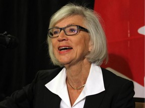 Chief Justice Beverley McLachlin answers questions from reporters at the Canadian Bar Association's national conference in Calgary on Thursday, August 13.