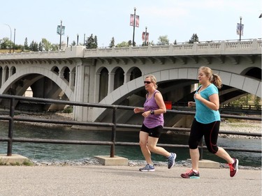 Calgarians enjoy the killer weather by biking, walking and jogging on Calgary's path systems, in Calgary on August 10, 2015.