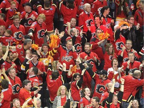Calgary Flames fans went crazy after Johnny Gaudreau scored the tie goal against the Anaheim Ducks with 20 seconds to go in regulation time during playoff action at the Scotiabank Saddledome on May 5.
