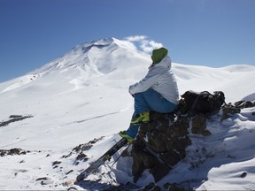 It's an adventure Chasing Winter in Chile, South America. Skier: Claire Smallwood takes in the view at the Corralco ski resort.