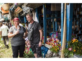 Cynthia and Brian Boyd take a minute at the Mallick Flower Market in Kolkata, India during The Amazing Race Canada. The married police officers from Winnipeg were the latest team to be eliminated from the series.