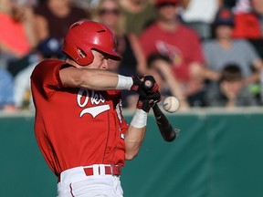 Okotoks Dawgs infielder Matt Morrow, seen in action on July 22, hit a big home run and crossed the plate for the winning run on Monday as the WMBL team took a 2-0 series lead on Medicine Hat with a 5-4 win.