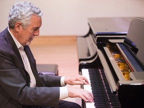The man behind the piano (and the CPO) is new president and CEO Paul Dornian.