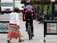 A cyclist uses the Stephen Avenue Mall designated cycle track earlier this year.