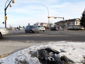 Car parts remain on the ground  on January 27, 2013 after the crash at  the intersection of 68 Street and 26 Avenue N.E.