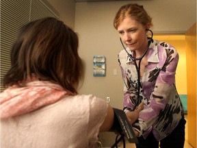 Dr. Kerry McBrien, study author and family physician, performed a study that analyzed the cost of hypertension to the health-care system. She was photographed on August 12, 2015.