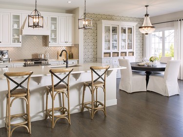 The kitchen and dining area in the Insignia show home at Mahogany in Calgary.